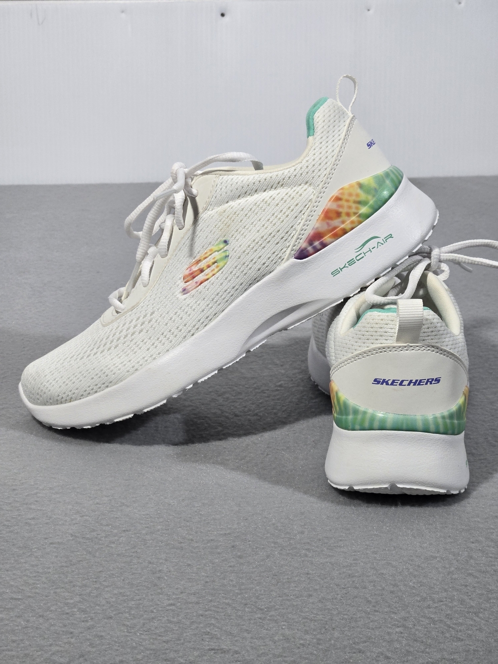 Skechers Women’s White Athletic Slip-Ons with Multicolor Tie-Dye Heel